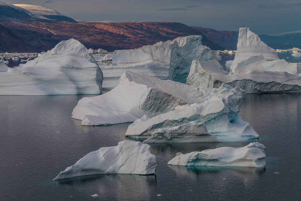 Floating icebergs in polar waters